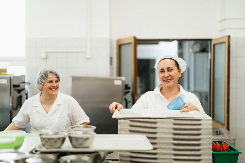 Care home kitchen team working together efficiently